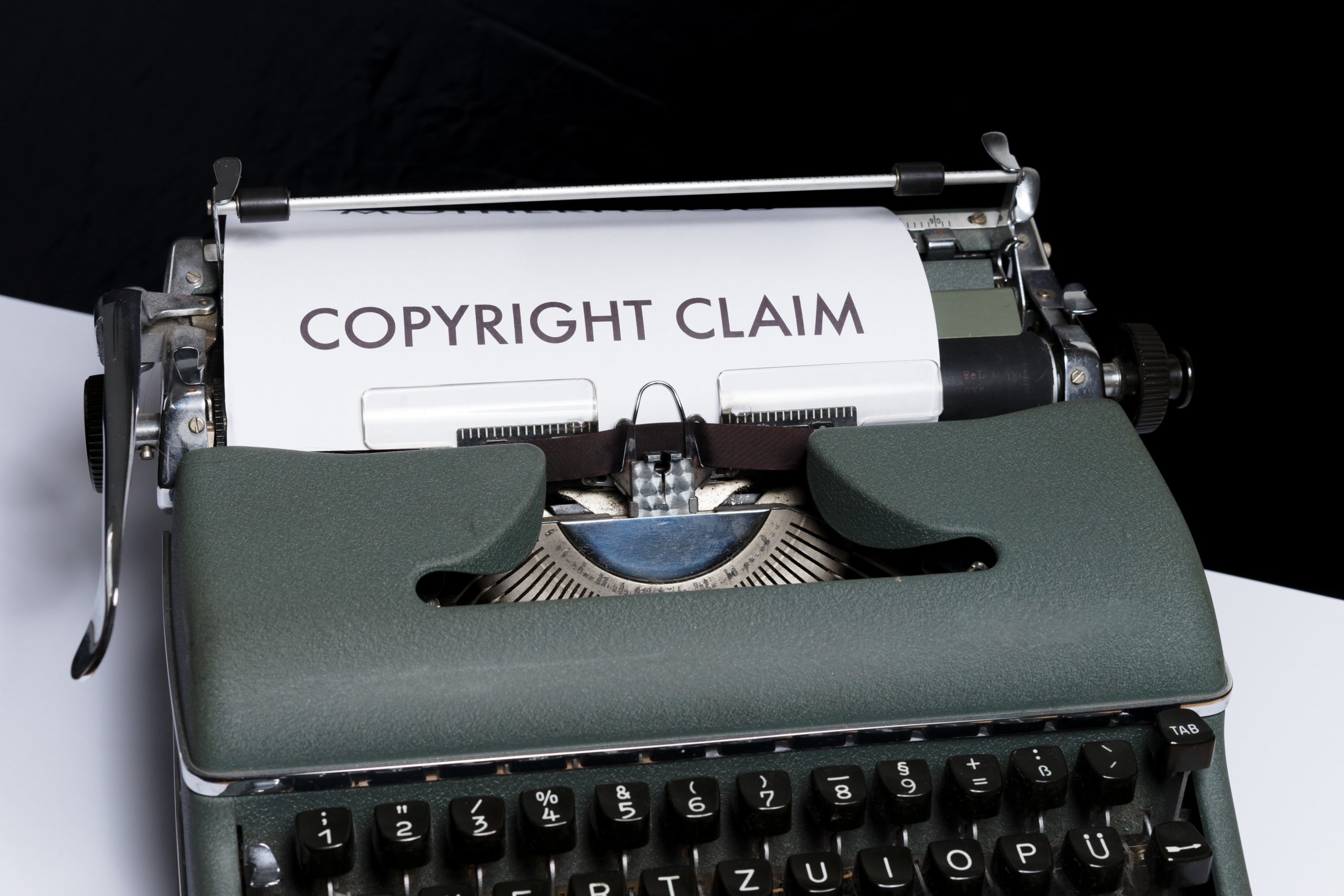 Copyright claim printed on a paper in a typewriter speaking about liability insurance.