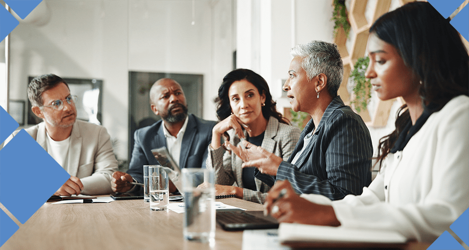 Medical professionals conducting a medical practice insurance review meeting with Unity Insurance