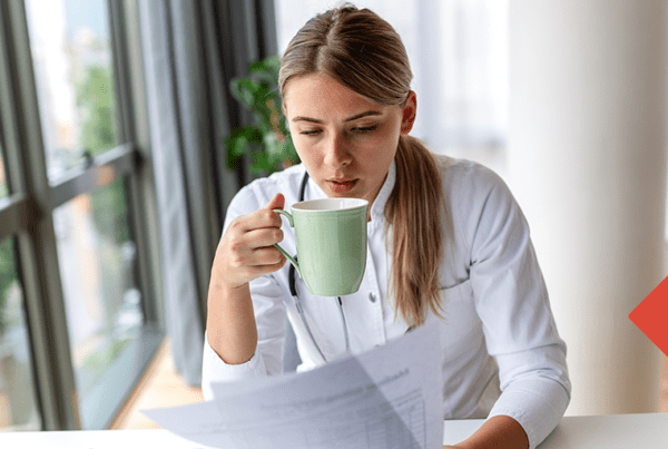 Early-career physician reviewing individual disability insurance options with Unity Insurance